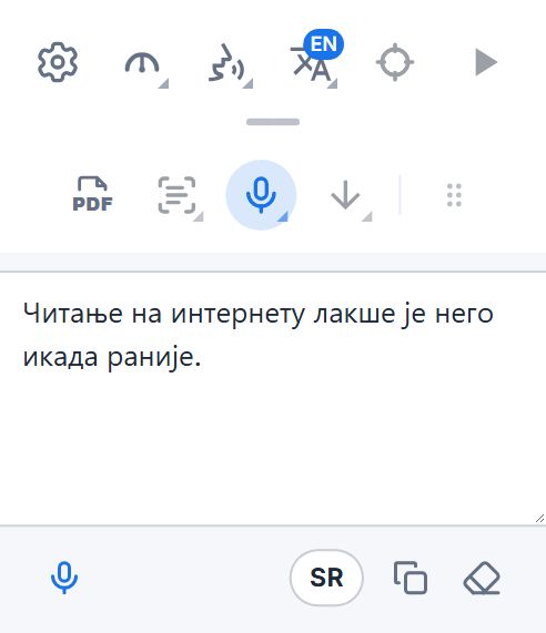 Readalix трака са алаткама са пољем за диктирање: издиктиране речи, дугме микрофона за додавање још текста, дугме за језик и дугмад за копирање и брисање.