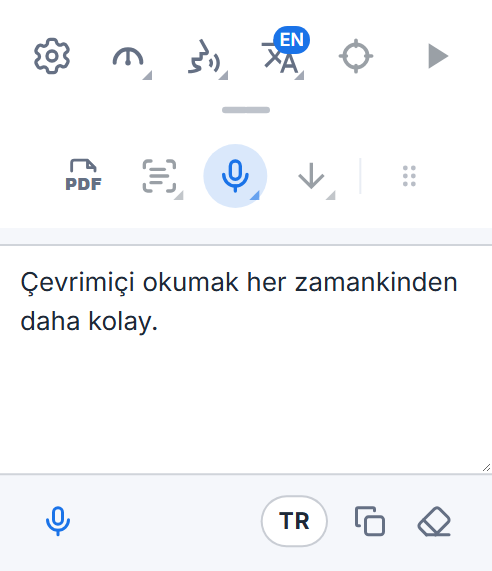 Dikte kutusuyla Readalix araç çubuğu: dikte edilen sözler, daha fazlasını eklemek için bir mikrofon düğmesi, dil düğmesi ve onları kopyalayıp temizlemek için düğmeler.